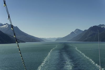 Scenic view of mountains against clear blue sky