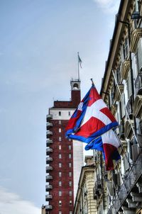 Exterior of building with flags