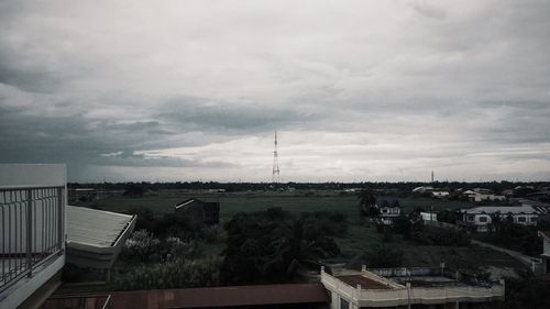 View of beach against cloudy sky