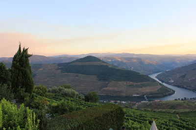 Scenic view of mountains against sky during sunset