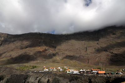 Scenic view of land against sky