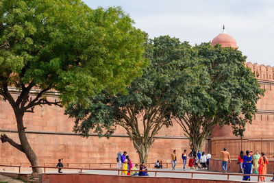 Group of people outside temple