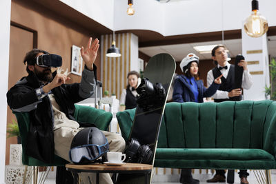 Side view of man working in meeting