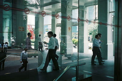 Full length of woman standing in city