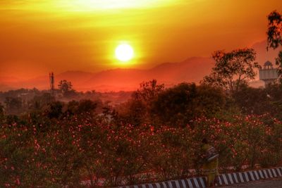 Scenic view of landscape at sunset