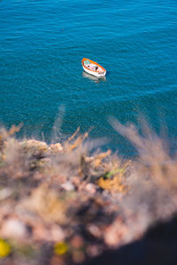 High angle view of toy floating on sea