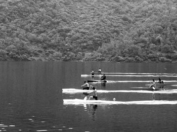 People on boat in sea