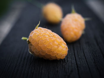 Close-up of yellow fruits on table