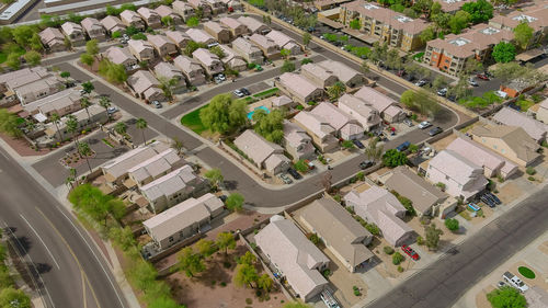 High angle view of street amidst buildings in city