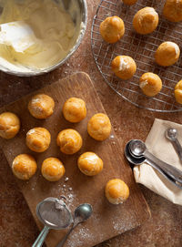 High angle view of cream puff on table