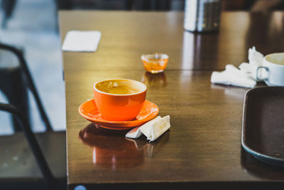 Close-up of coffee cup on table