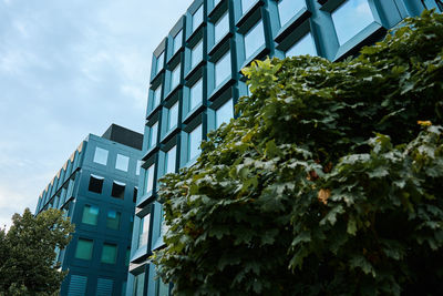 Low angle view of modern building against sky