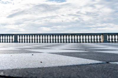 Bridge over sea against sky