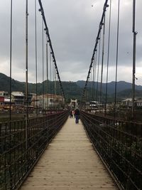 View of suspension bridge against sky