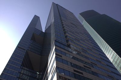 Low angle view of modern buildings against sky