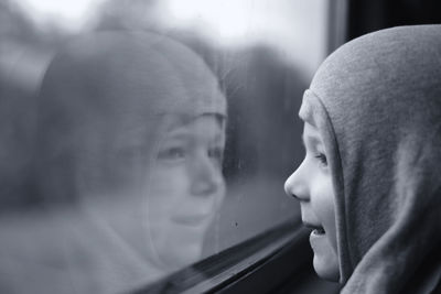 Close-up of child in train