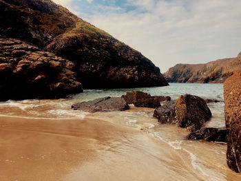 Scenic view of beach against sky