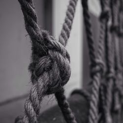 Close-up of ropes tied up rope