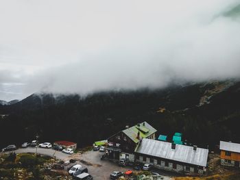 High angle view of trees and mountains against sky