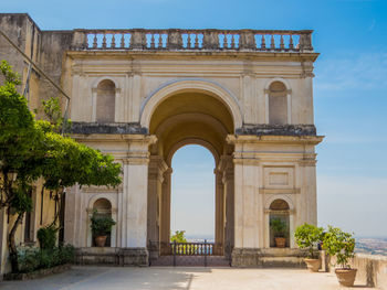 Entrance of historic building against sky