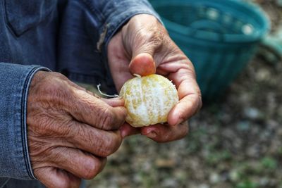 Close-up of man preparing food