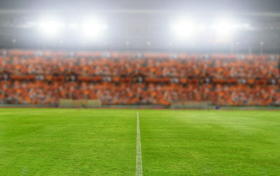 Illuminated soccer field at night