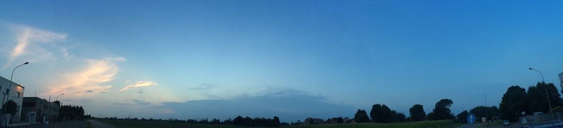 Scenic view of landscape against blue sky