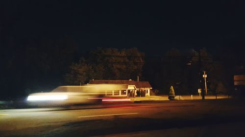 Light trails on road at night