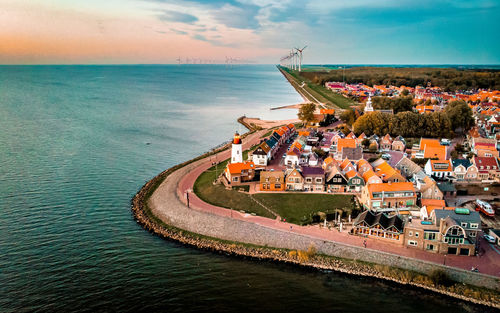 High angle view of sea against sky during sunset