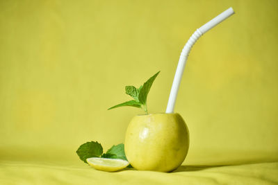 Close-up of granny smith apple on table