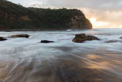 Scenic view of sea against sky during sunset