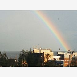 Rainbow over built structure