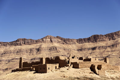 Scenic view of desert against clear sky