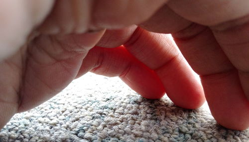 Low section of baby feet