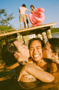 High angle view of young woman swimming in sea