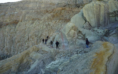 People on rock formations