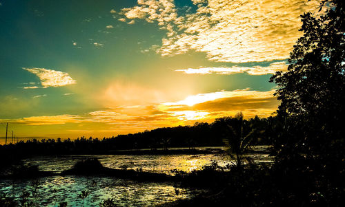 Scenic view of dramatic sky during sunset