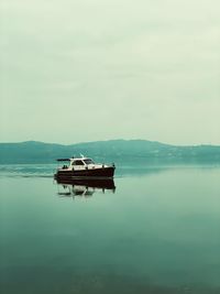 Boat on sea against sky