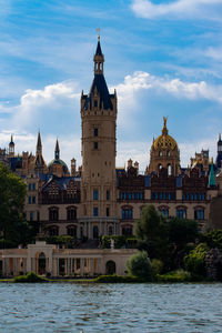 View of buildings against sky in city