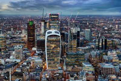 Aerial view of cityscape against sky