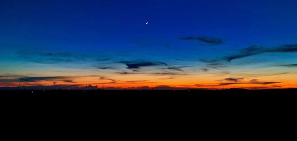 Scenic view of dramatic sky during sunset