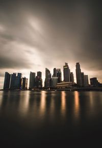 Modern buildings in city against sky