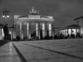 Group of people in front of historical building