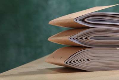 Close-up of book stack on table 