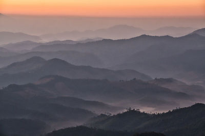 Scenic view of mountains against sky during sunset