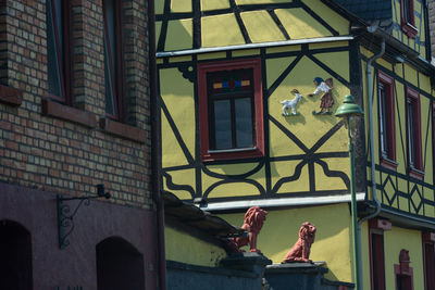 Low angle view of statue against building