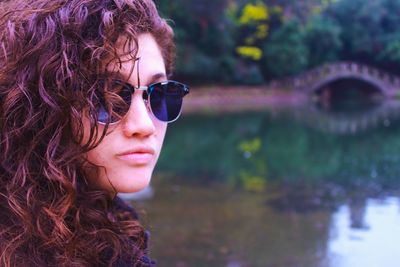 Portrait of young woman in sunglasses