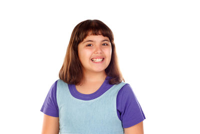 Portrait of smiling girl against white background