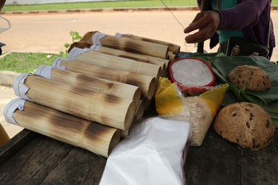 Thai food glutinous rice roasted in bamboo name is khaolam,tropical food.