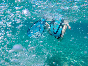 Person swimming underwater